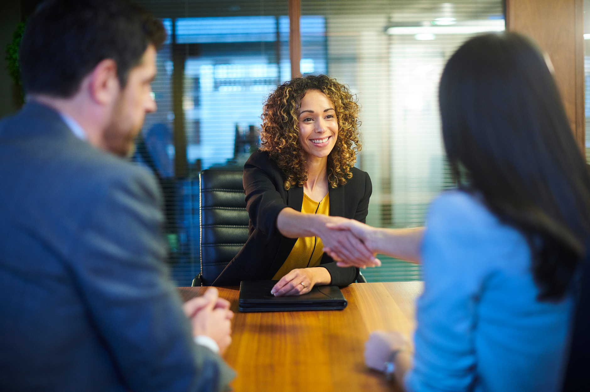 People shaking hands at a job interview