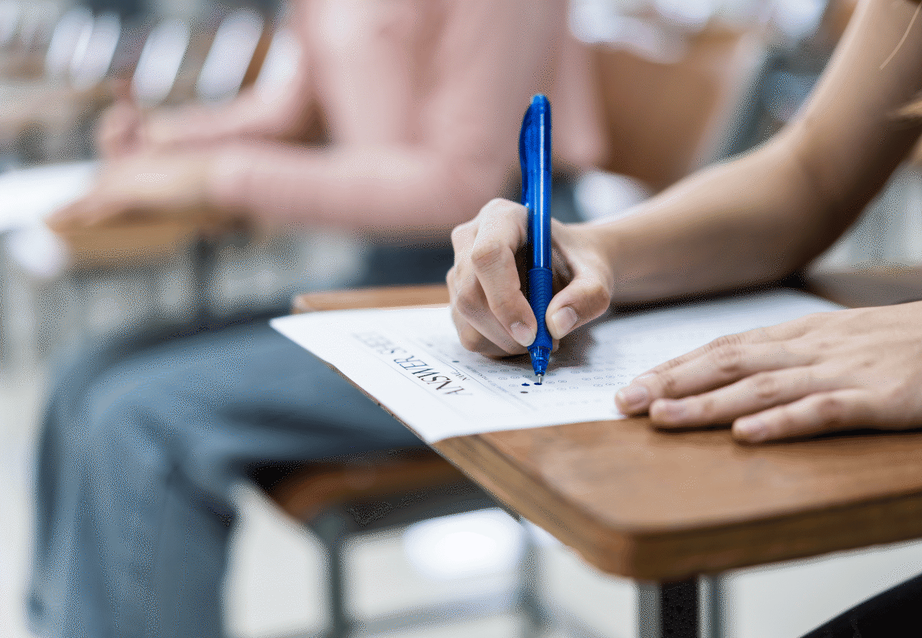 Woman writing an exam