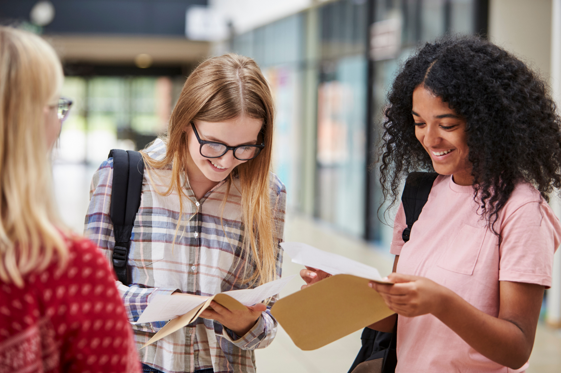 Students happily receiving their exam results