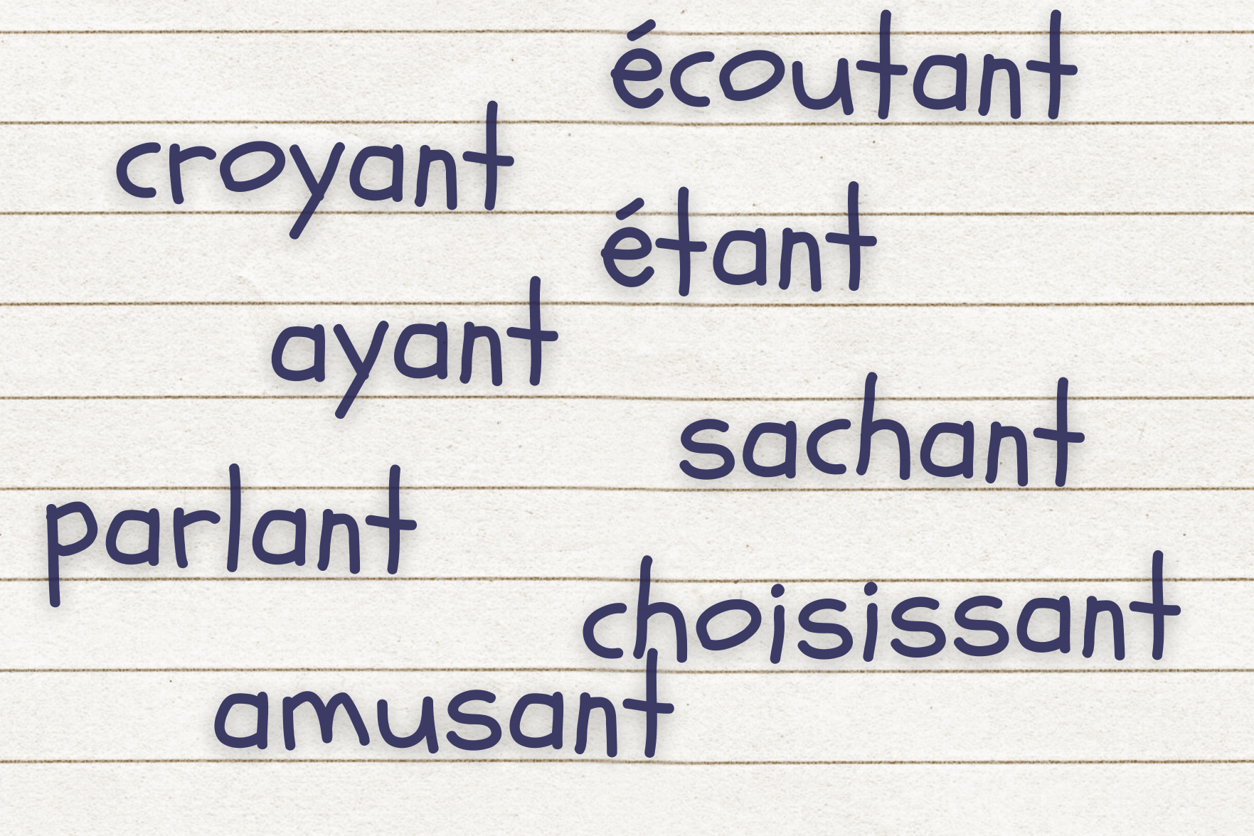 Different French present participles written on notepaper