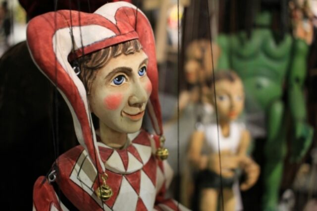 A harlequin puppet