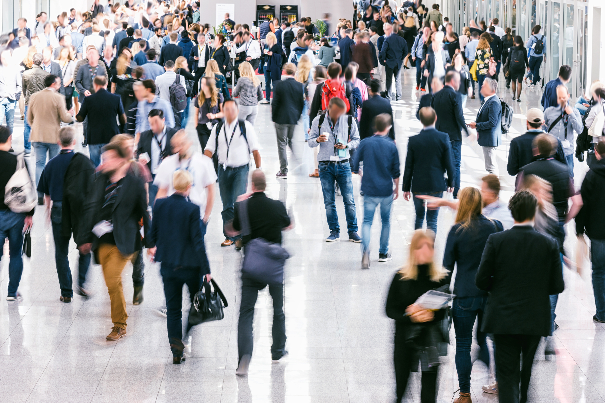 A crowd of people walking