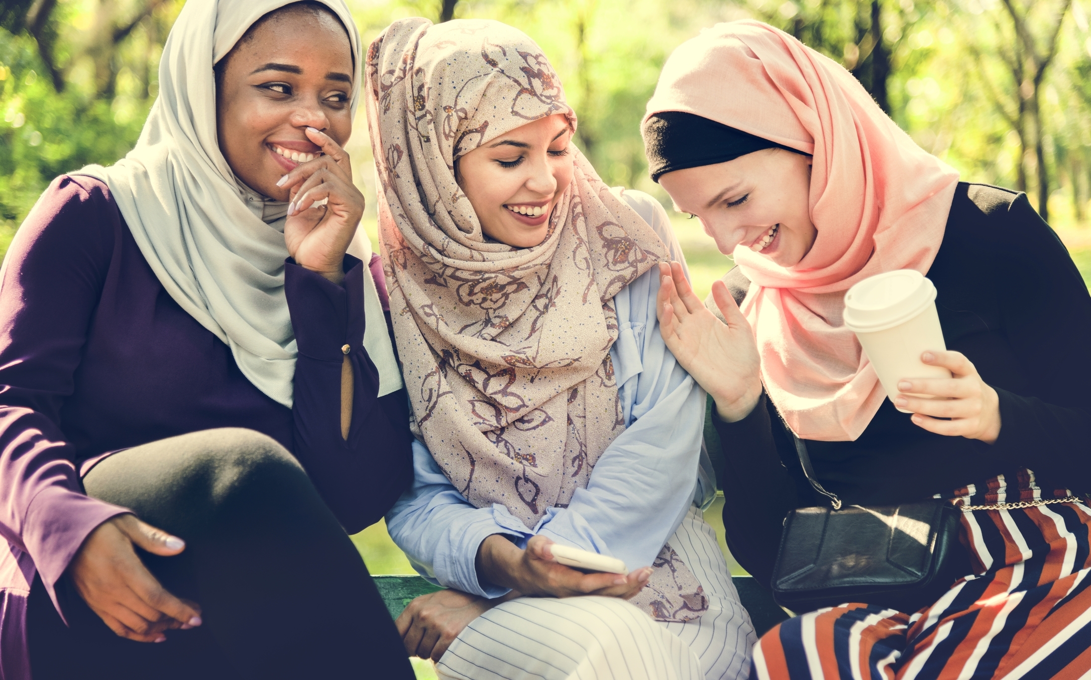 Group of women speaking to one another