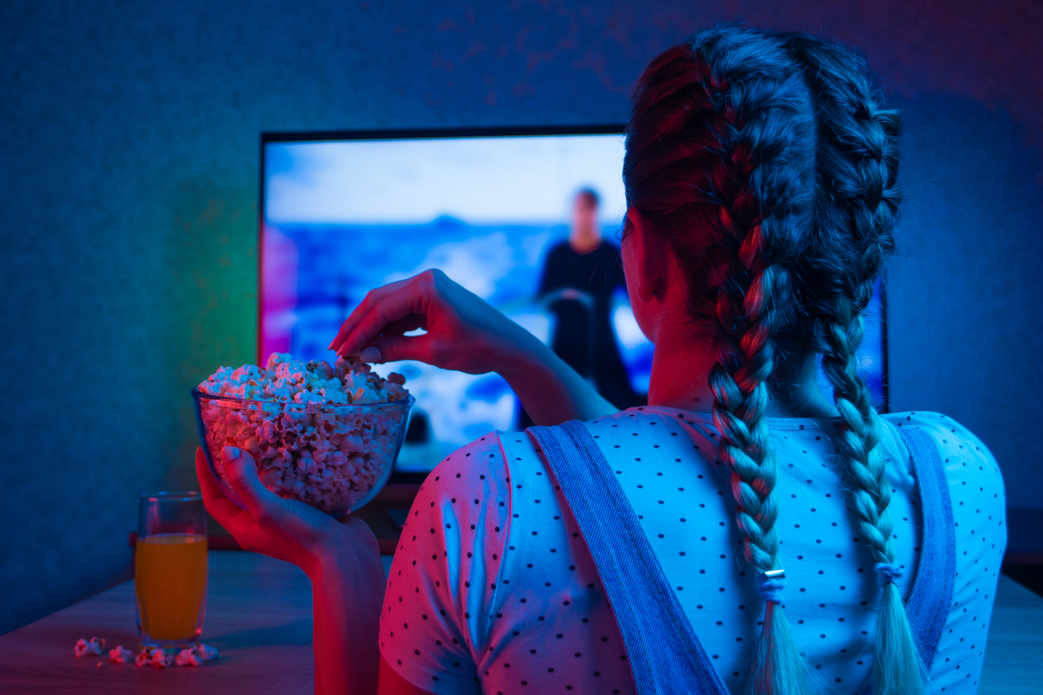 A girl watching a film