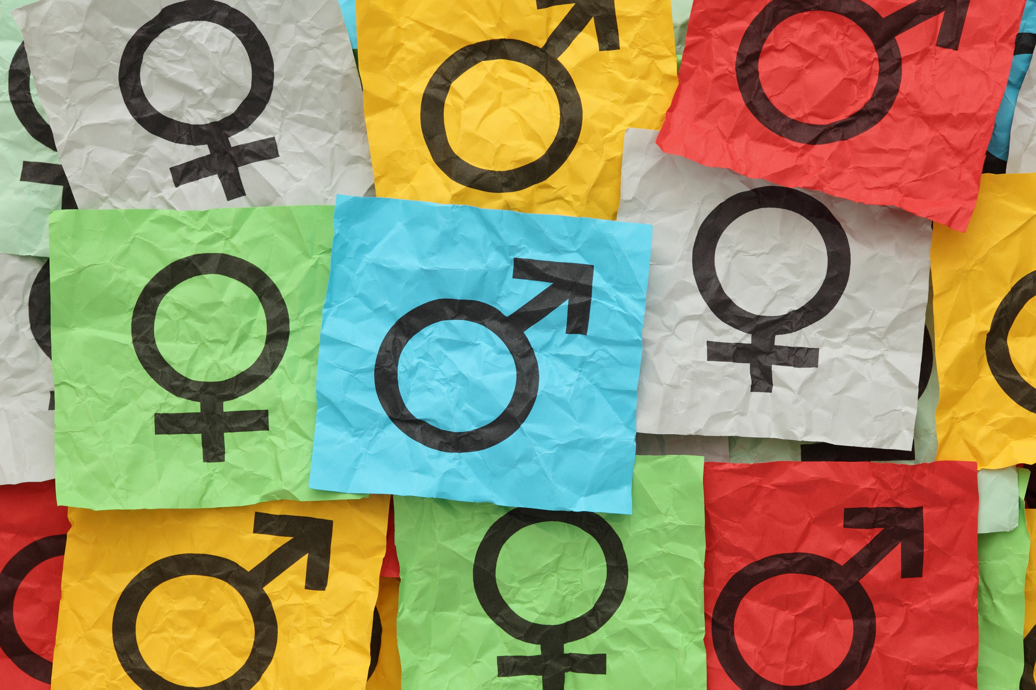 Post-it notes depicting different gender symbols