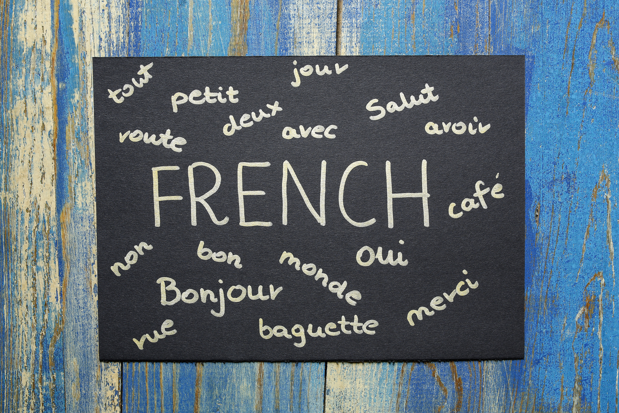 Blackboard with French words