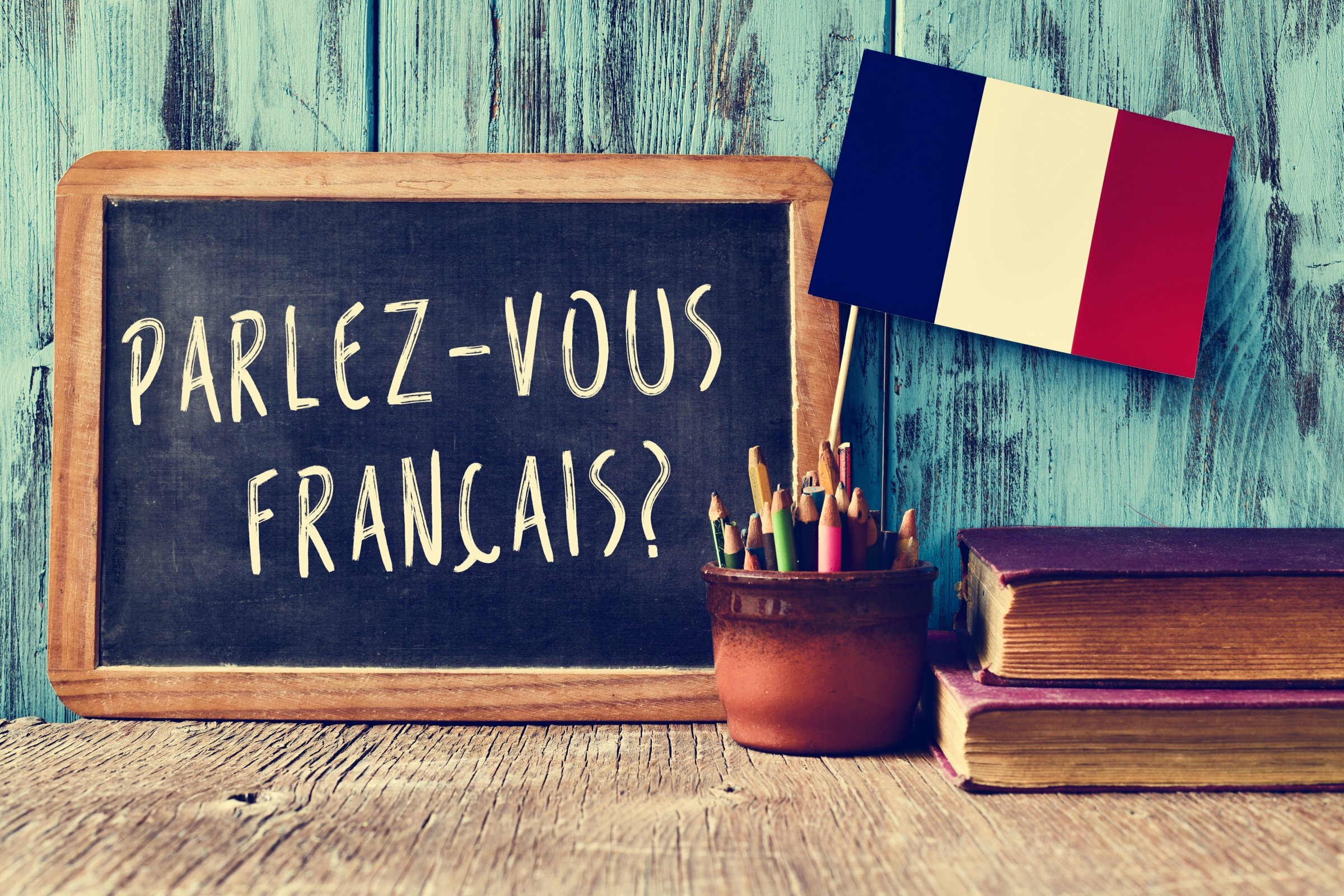Blackboard saying 'Parlez-vous Francais ?'