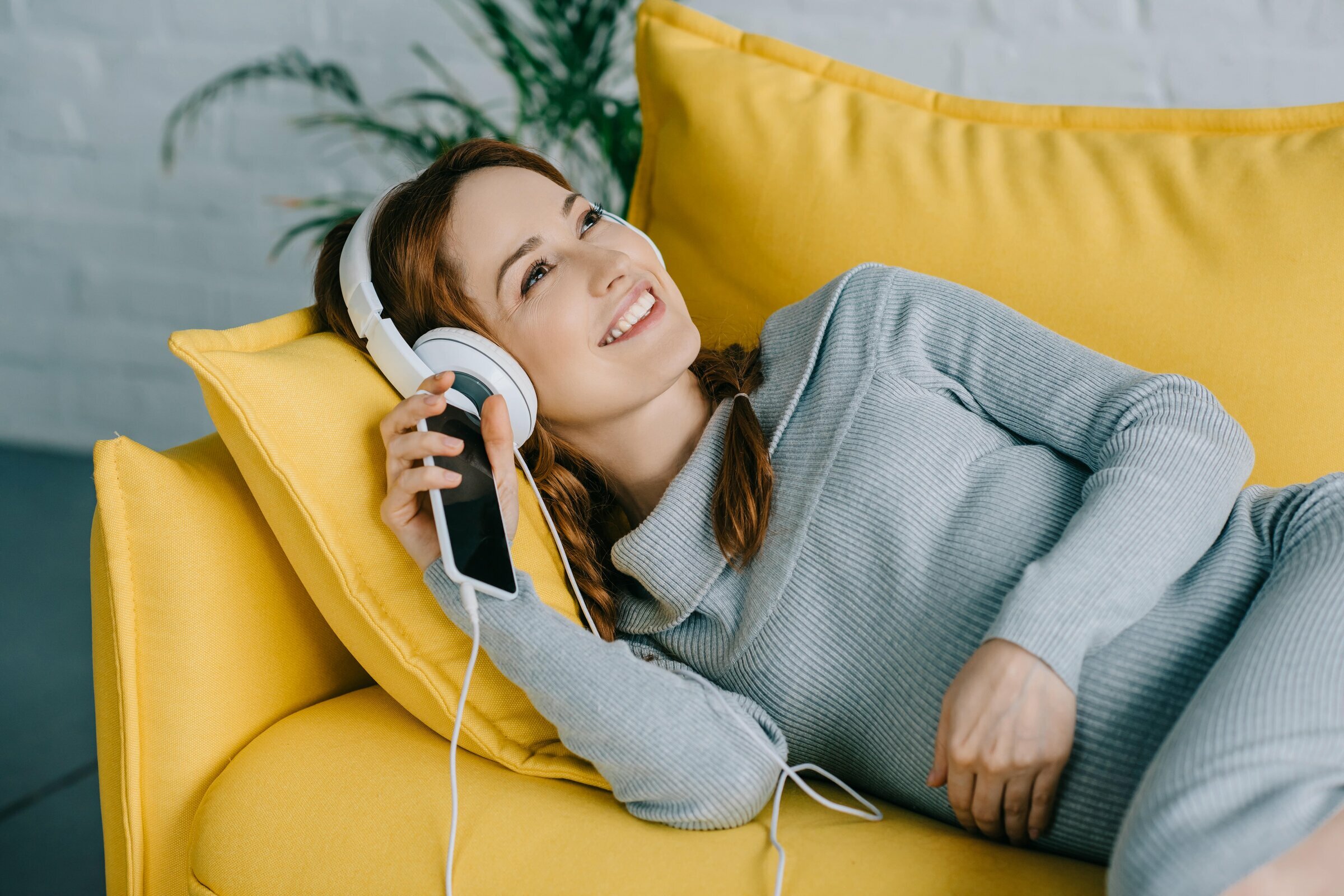 Woman listening to podcast